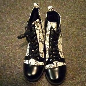 Black and White Faux Leather/Snakeskin Booties. Worn once, great condition